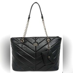 A steve madden faux quilted tote offers a classic style to any look